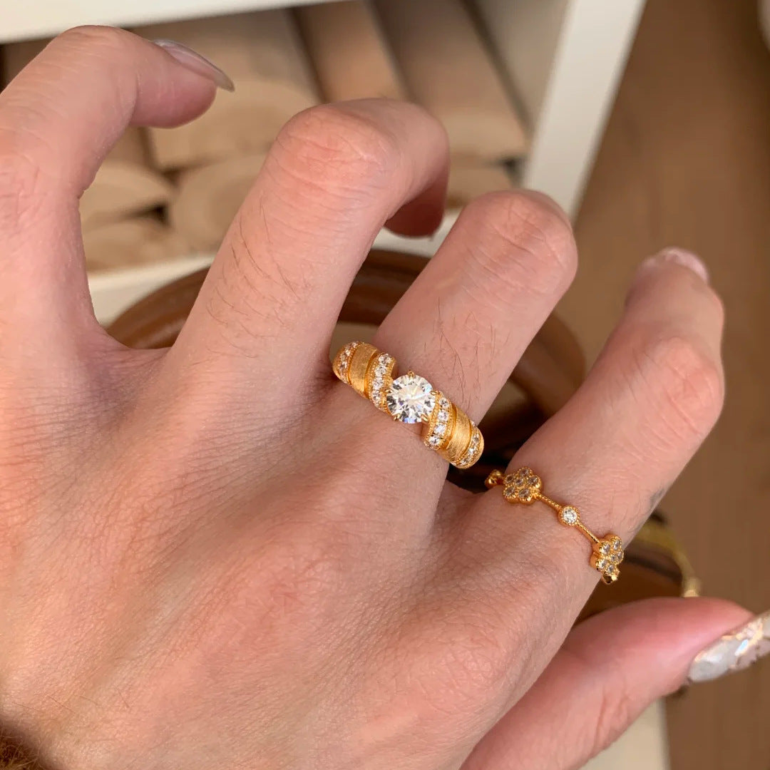 Vintage brushed Möbius horn-shaped diamond ring