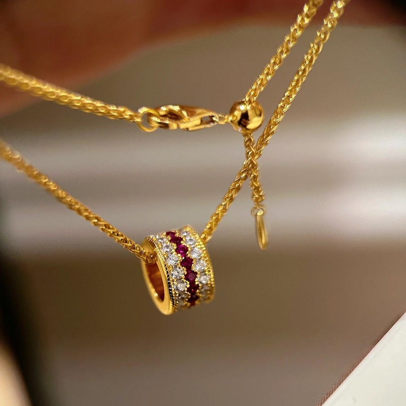 Diamond-set red corundum ring and necklace